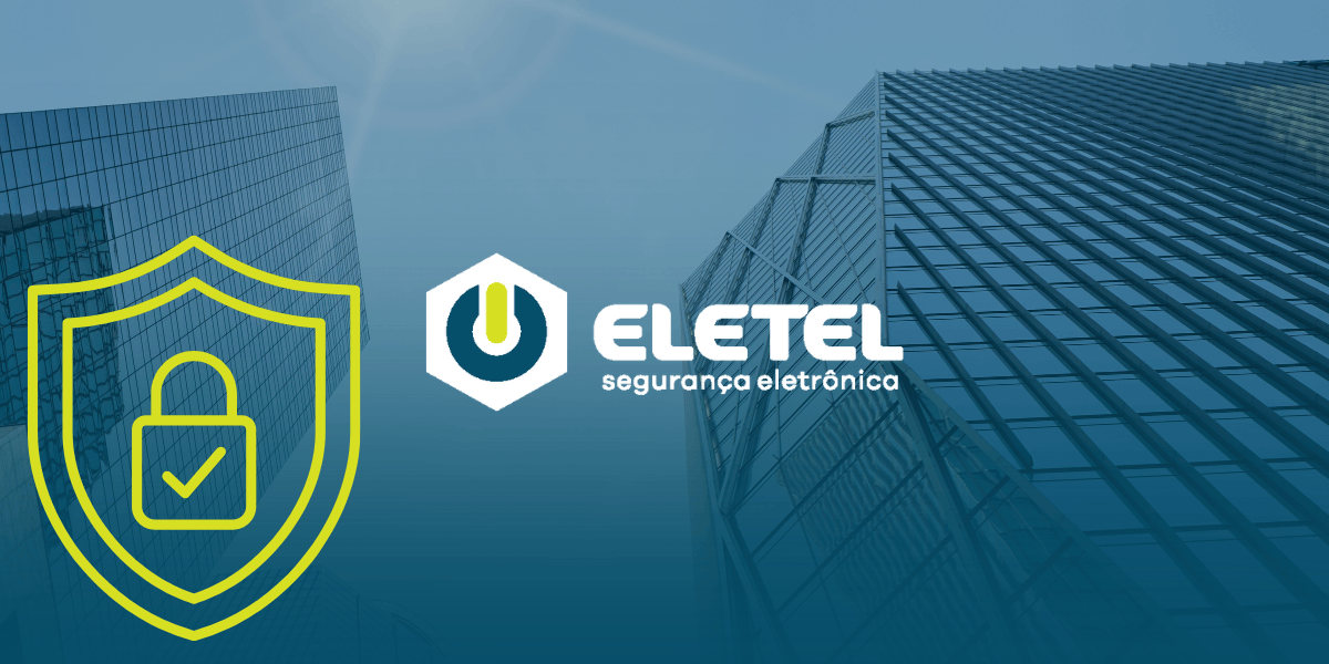 Fachada de prédio corporativo moderno espelhado sob o sol, apresentando o logotipo da Eletel e um ícone amarelo de escudo com cadeado à esquerda.